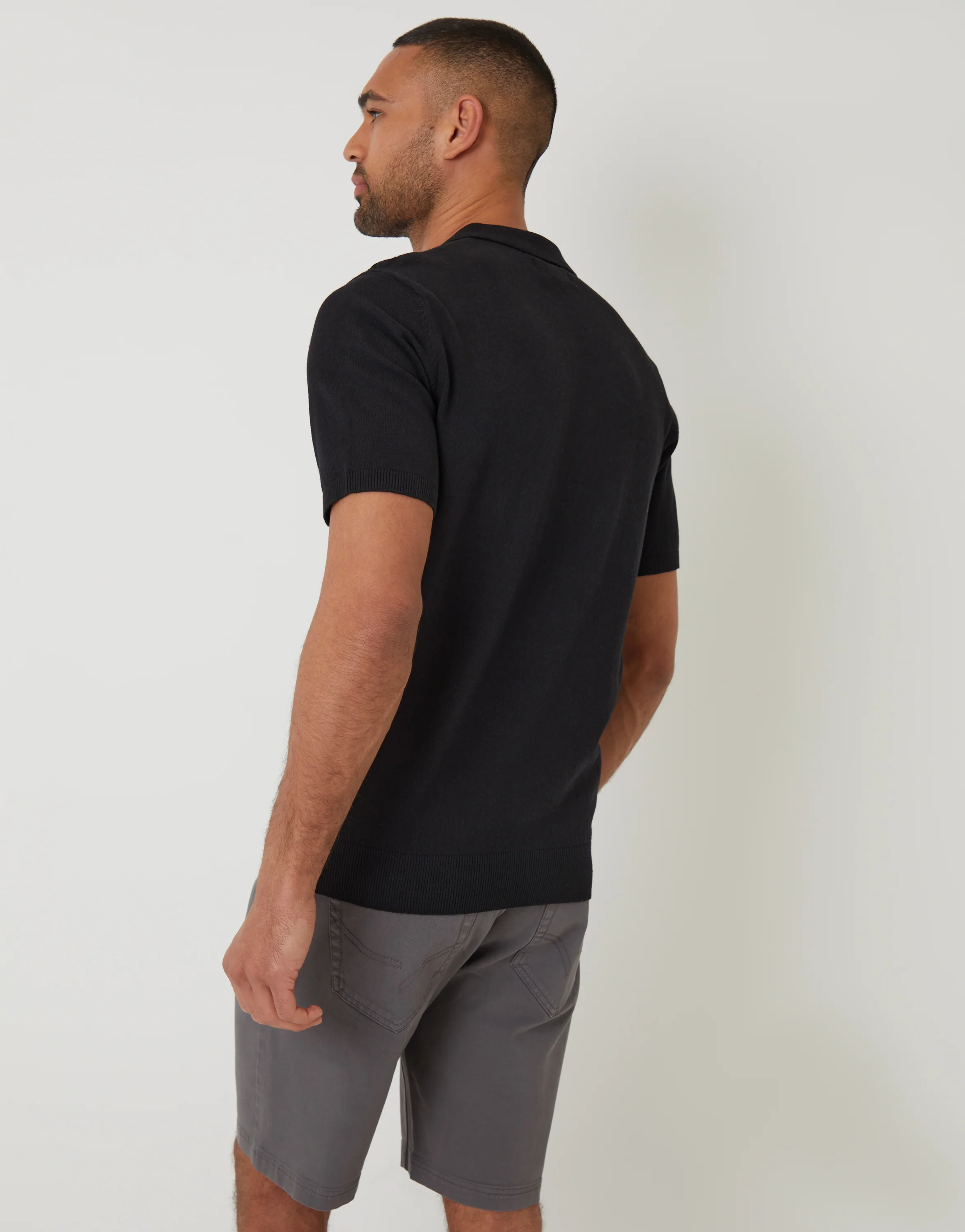Textured Front Quarter Zip Knitted Polo in Black - Image 2