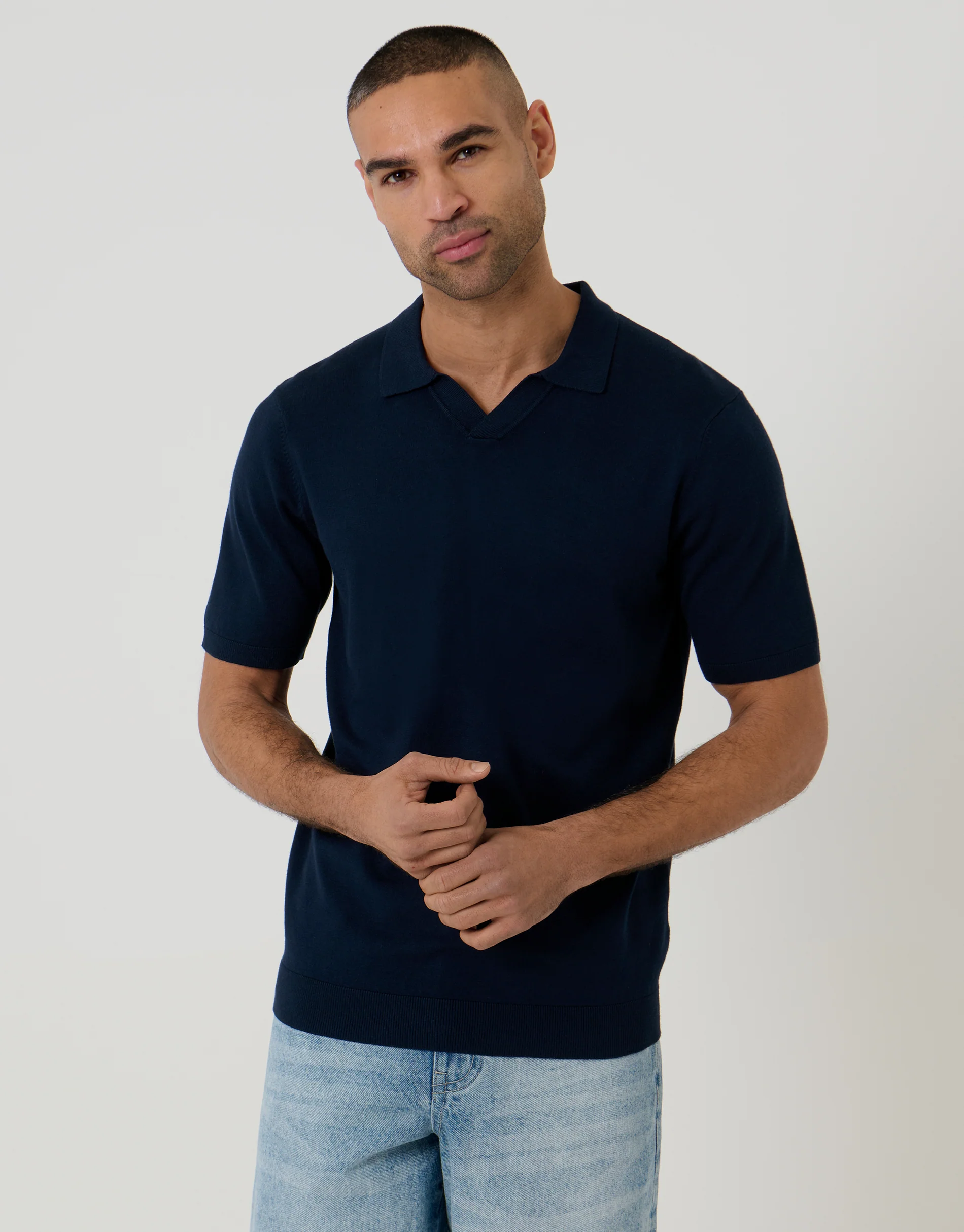 Knitted Trophy Neck Polo in Navy