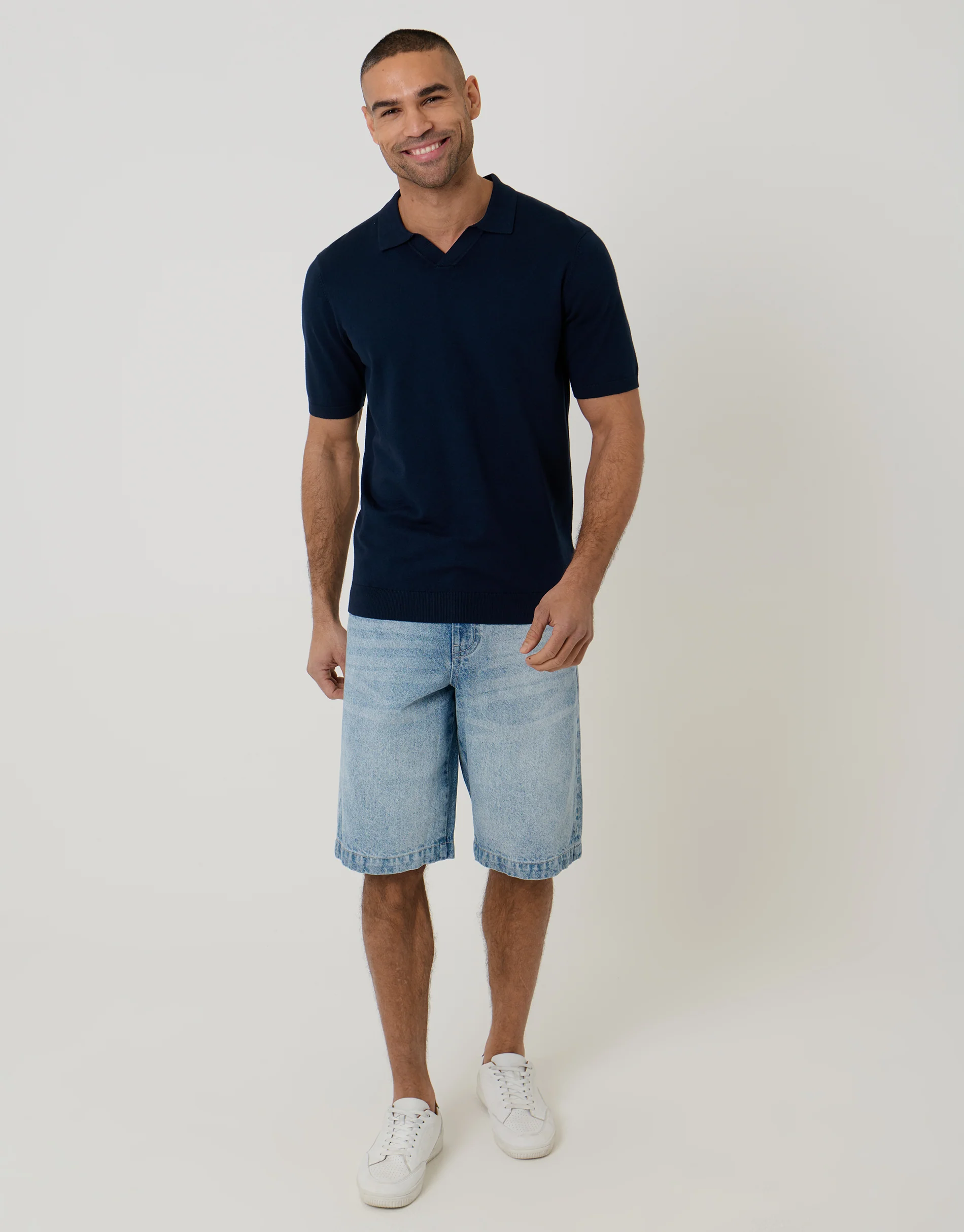 Knitted Trophy Neck Polo in Navy - Image 3