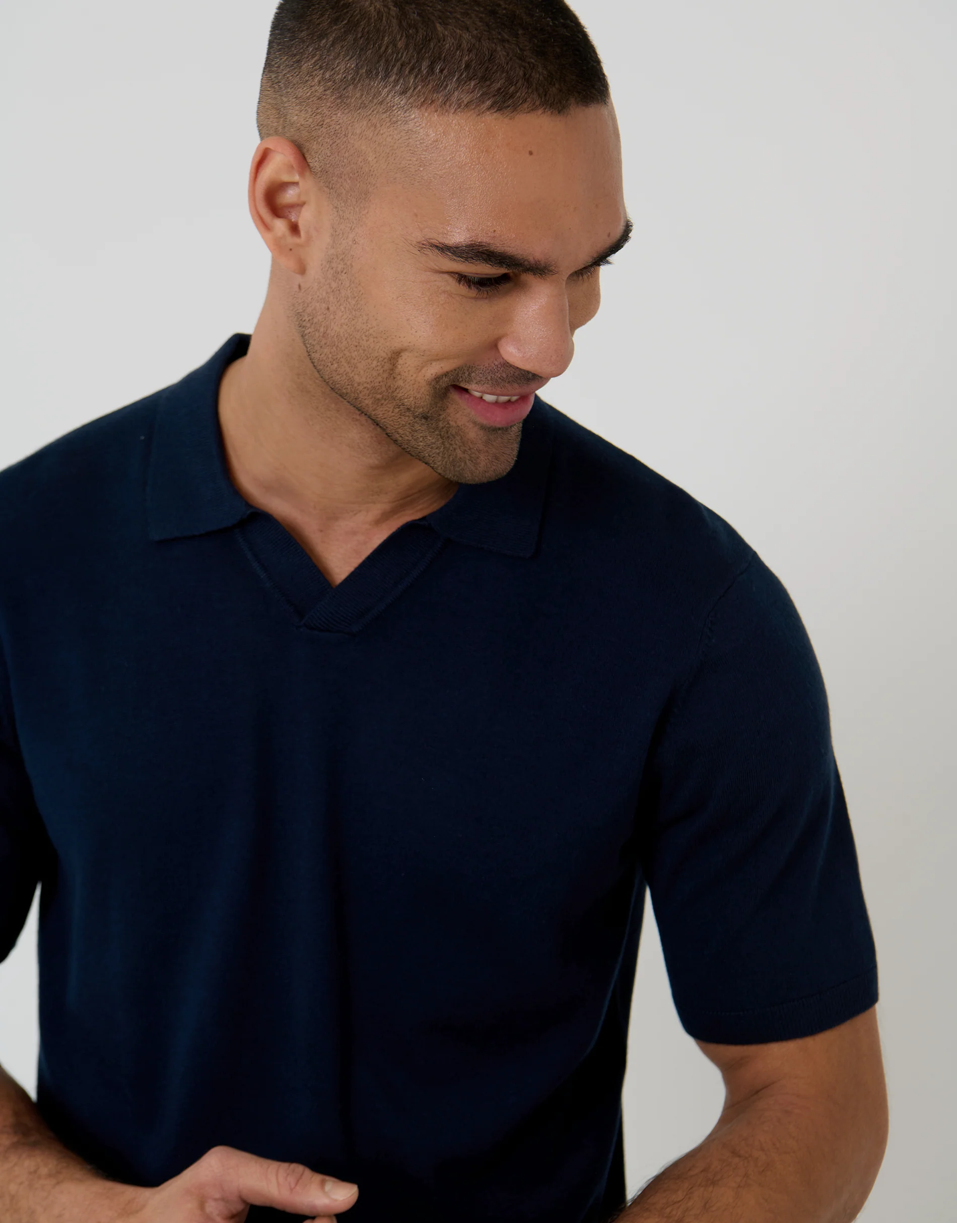 Knitted Trophy Neck Polo in Navy - Image 4