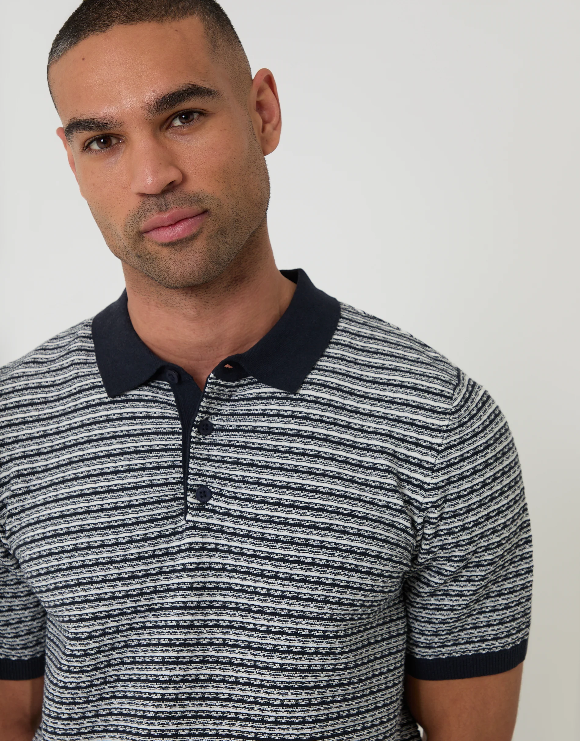 Textured Knitted Polo in Navy Stripe - Image 4