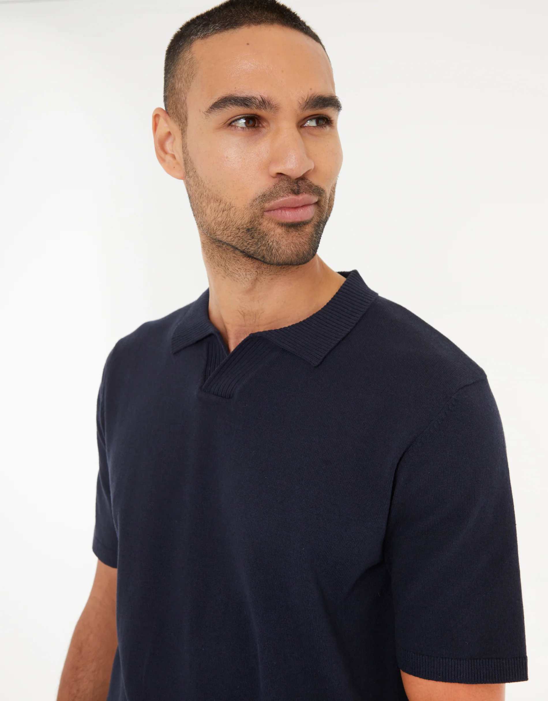 Trophy Neck Knitted Polo in Navy - Image 4