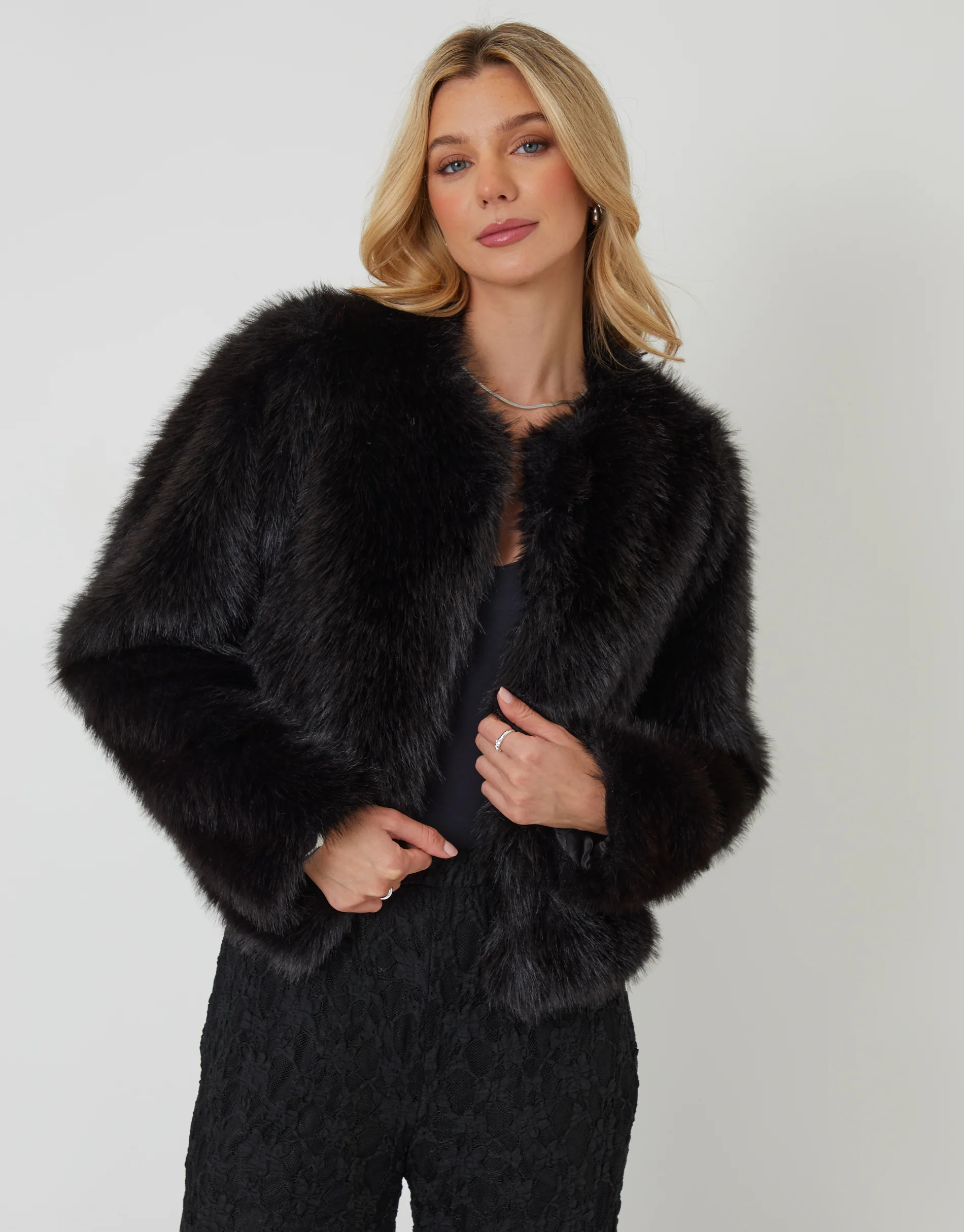 Collarless Faux Fur Coat in Black