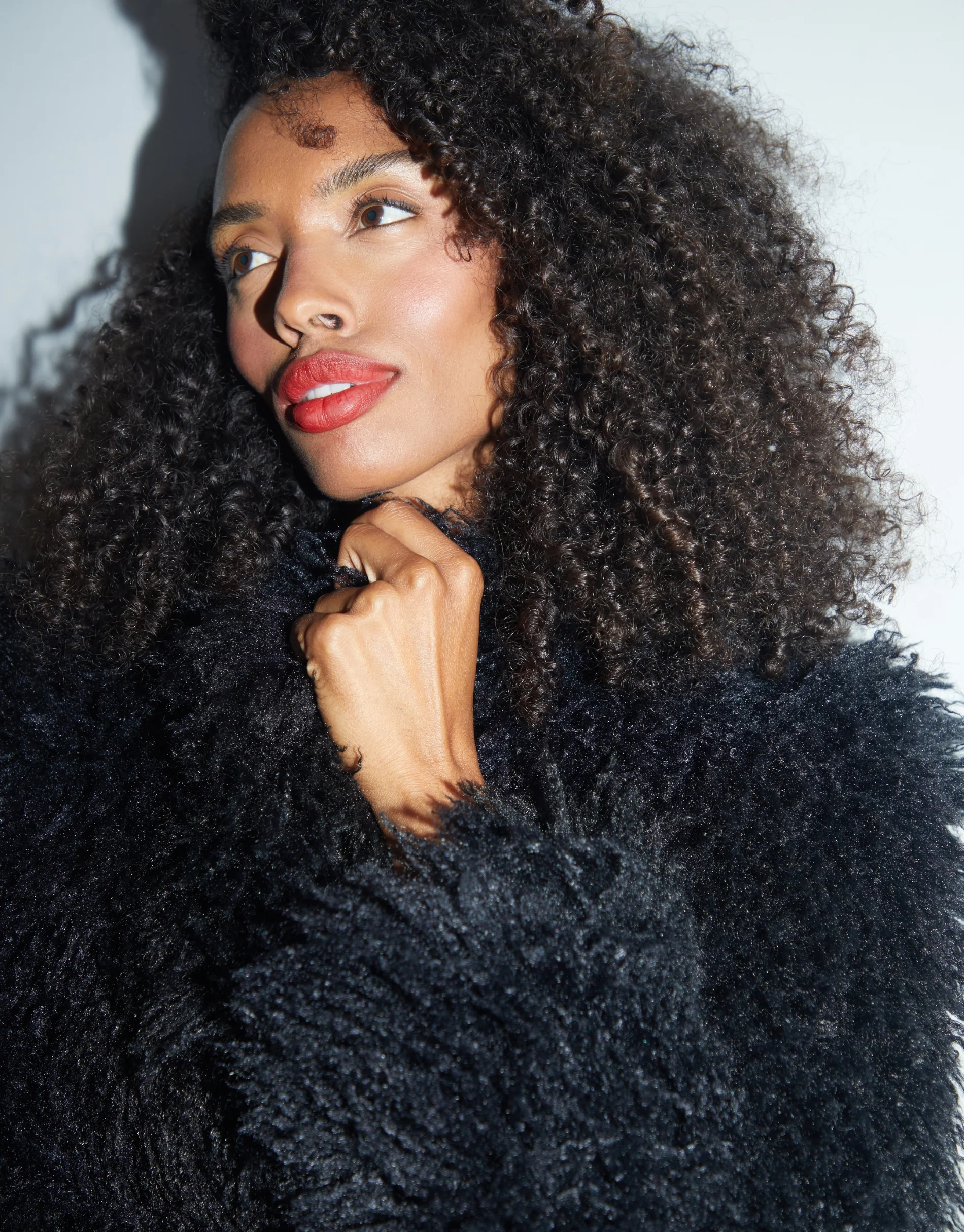 Mongolian Faux Fur Coat in Black - Image 5